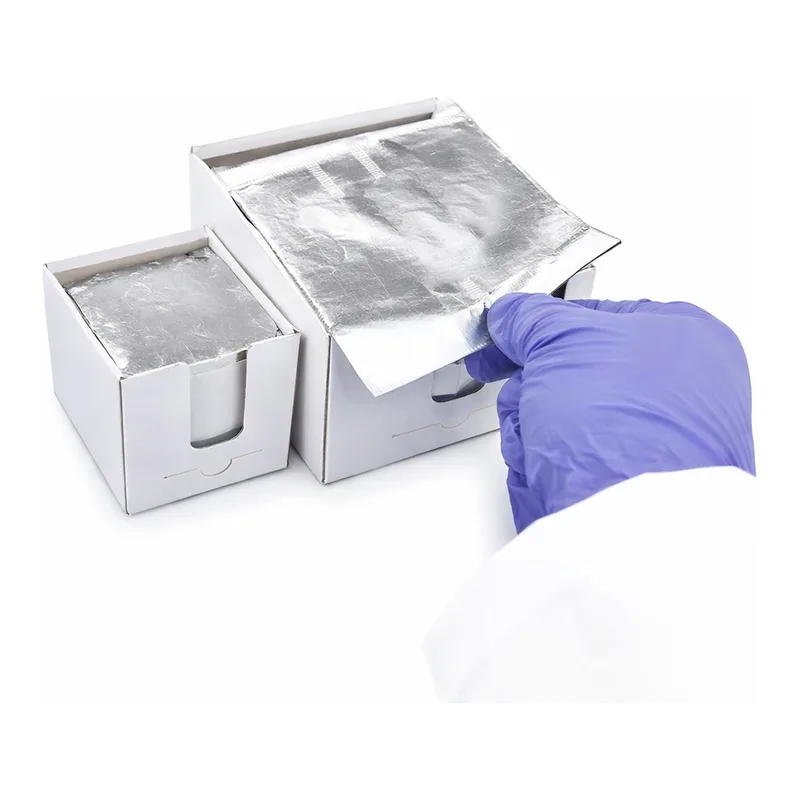 Merck Speedy-Foil aluminium squares interleaved with paper