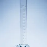 Merck Pyrex Measuring cylinder with spout, class A with white graduations