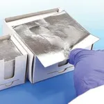 Merck Speedy-Foil aluminium squares interleaved with paper