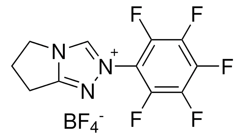 Merck 6,7-Dihydro-2-pentafluorophenyl-5H-pyrrolo[2,1-c]-1,2,4-triazolium tetrafluoroborate